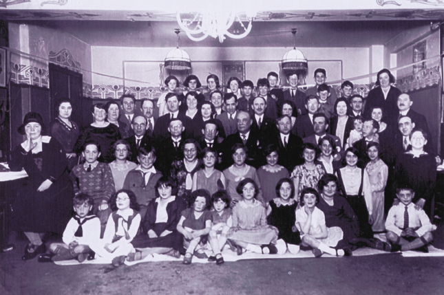 Yiddish school in Copenhagen, ca. 1930. (Left) Abraham Krakowsky with his daughter Henny, mother of the author, resting on his shoulder.